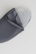 Travel Changing Pad in Moonlight Gray set up for a diaper change on the go